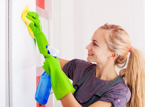 Curtains being cleaned in a bright living room