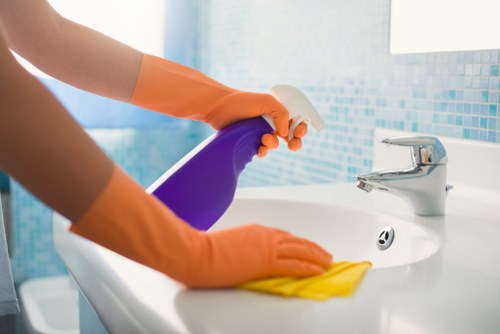Professional carpet cleaning process in a living room