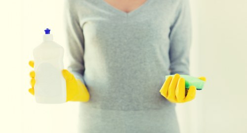 Common rug stains being treated with gentle cleaning methods